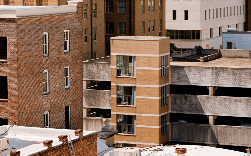 close up of tall brick buildings