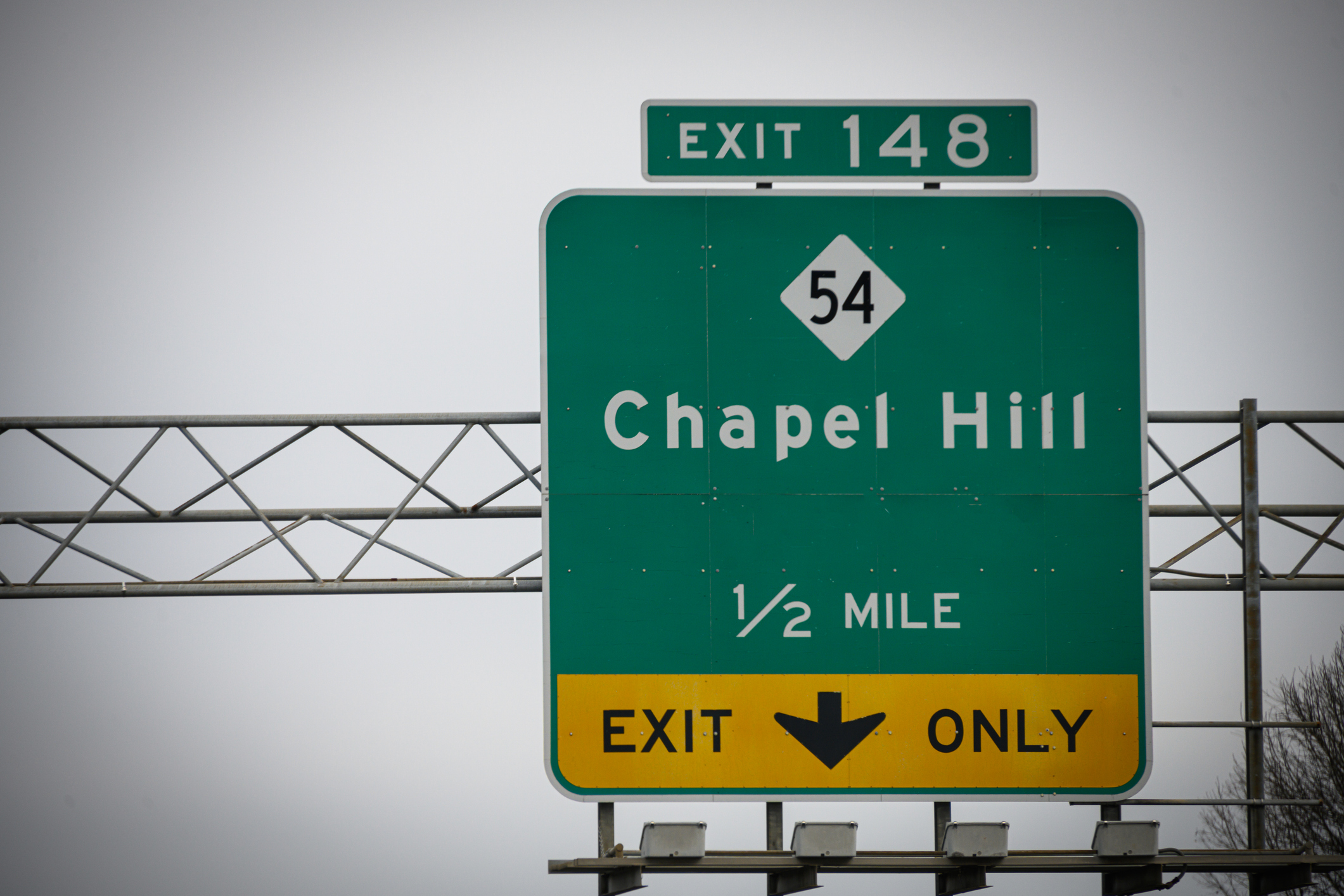 A highway sign leads to the way to Chapel Hill, NC, USA.